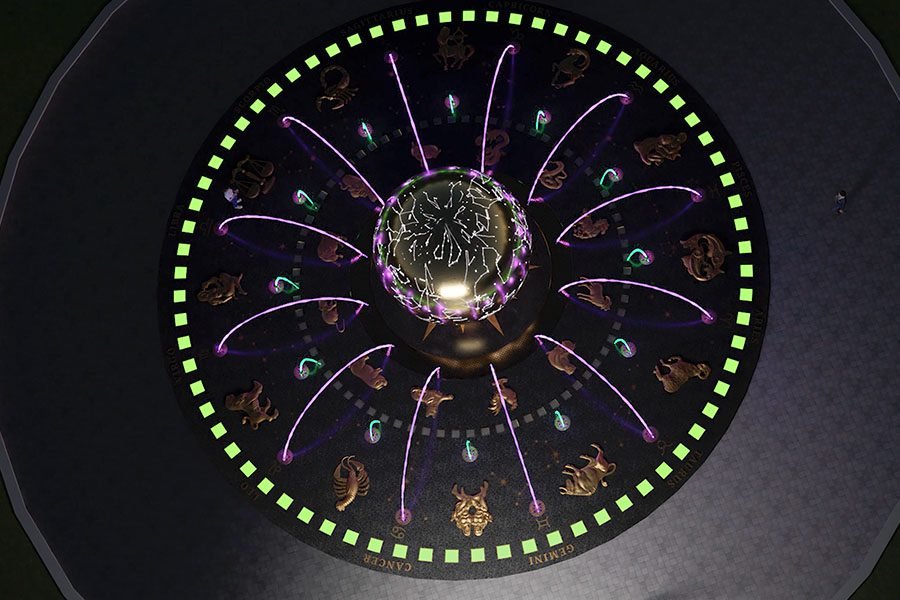 constellation sphere in zodiac fountain with lights and water at night