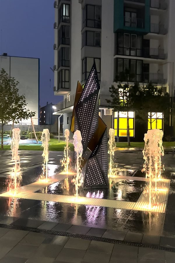 perforated metal art sculpture in the square