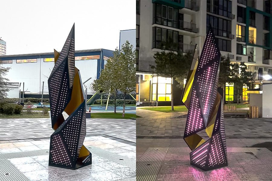 LED geometric fountain sculpture in residential complex