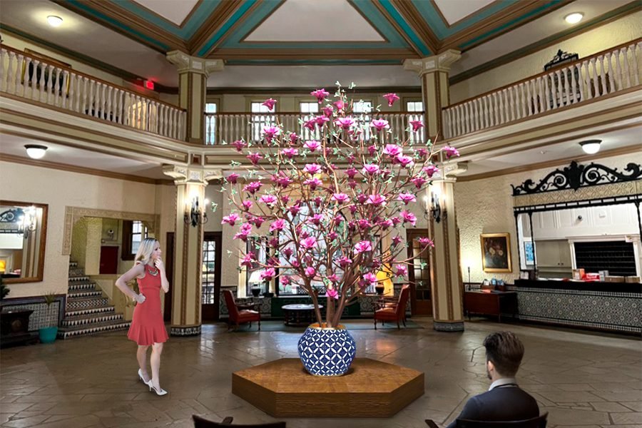 glass magnolia blossoms on metal sculpture art installation