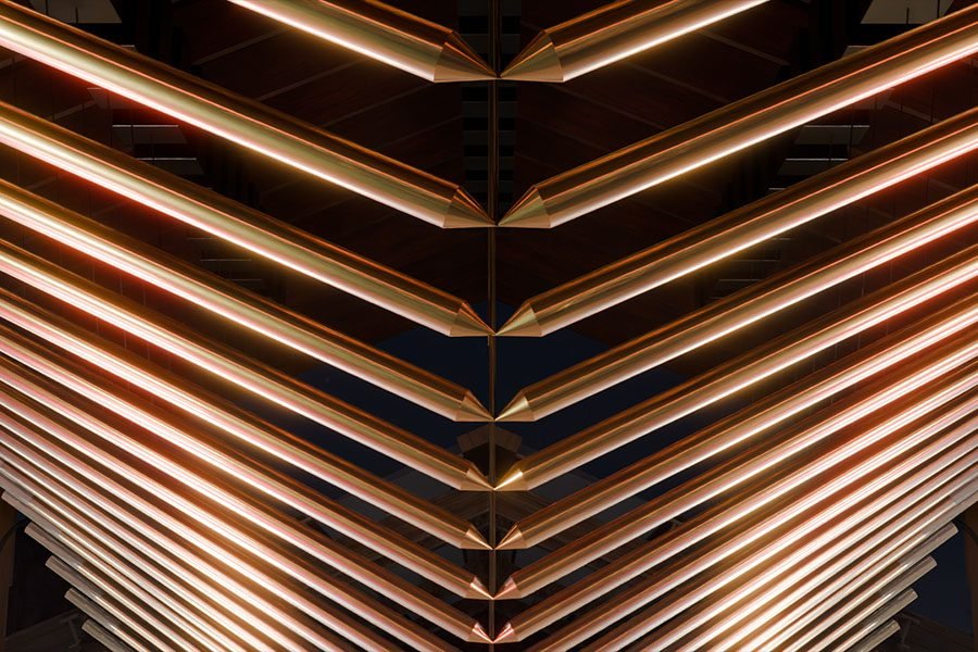 modern kinetic sculpture for Public Market in Washington state USA made from reflected metal and light