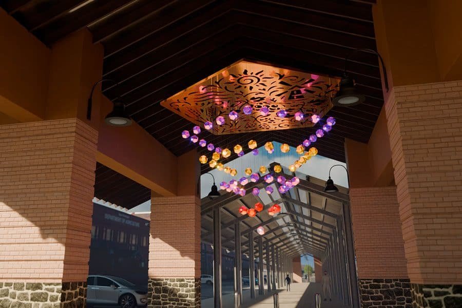 Kinetic installation Five Elements with colourful dodecahedrons in daylight