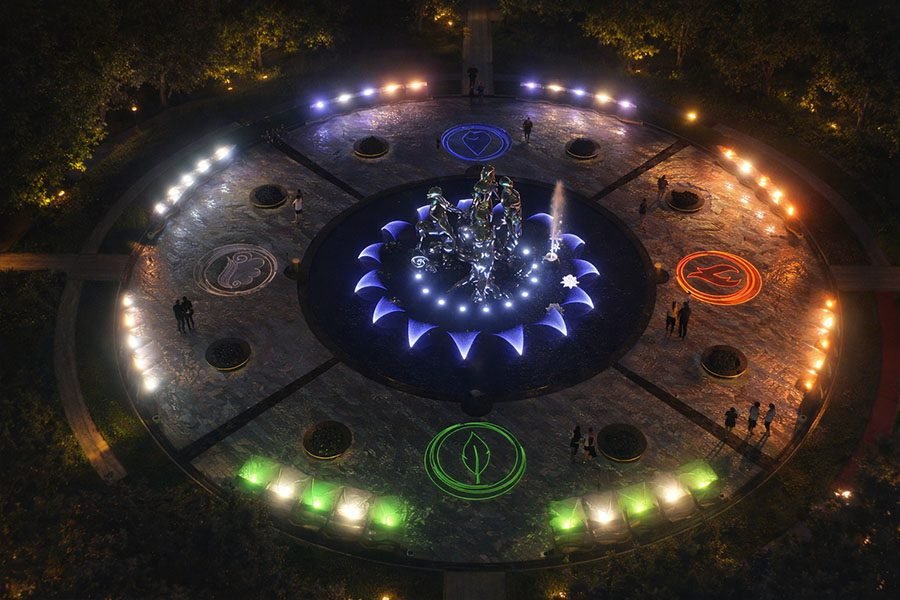 round  water and art installation with lighting 