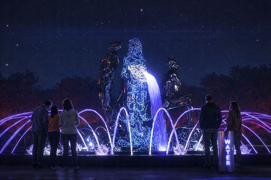 illuminated abstract human sculptures with water fountain